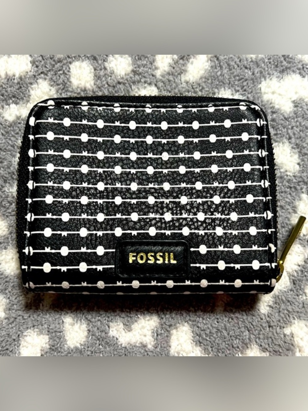 Fossil Logan zip-around bifold wallet, black & white dotted lines, gold hardware
